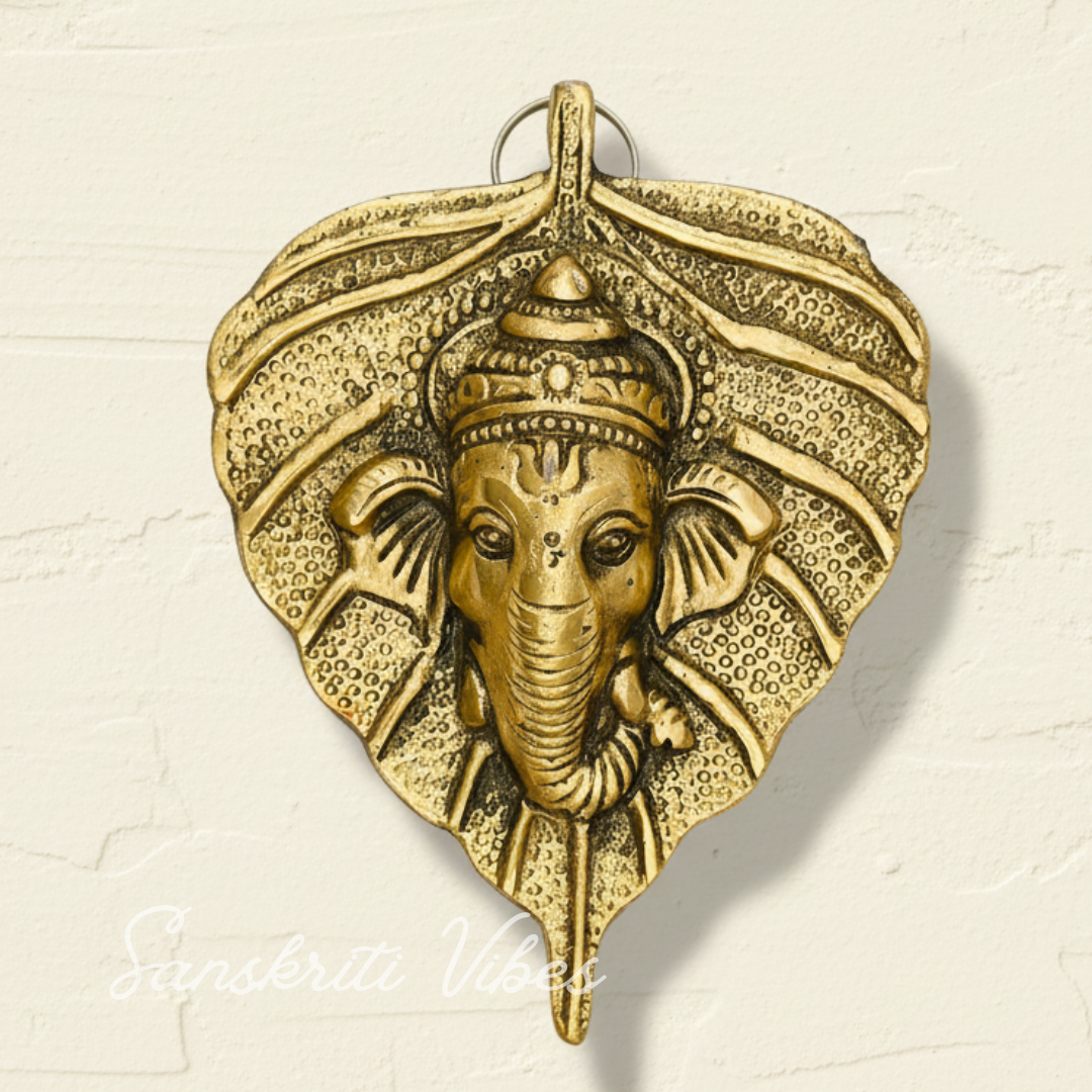 Metal Golden Ganesha on Leaf Wall Hanging Sculpture Ganpati Feng Shui Decorative Showpiece for Home and Office