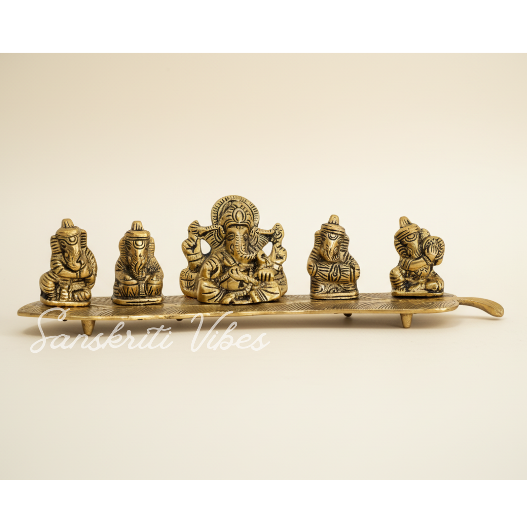 White Metal Gold Plated Ganesha On Leaf With Musical Instrument Metal Statue For Pooja Home Decor And Gift Purpose