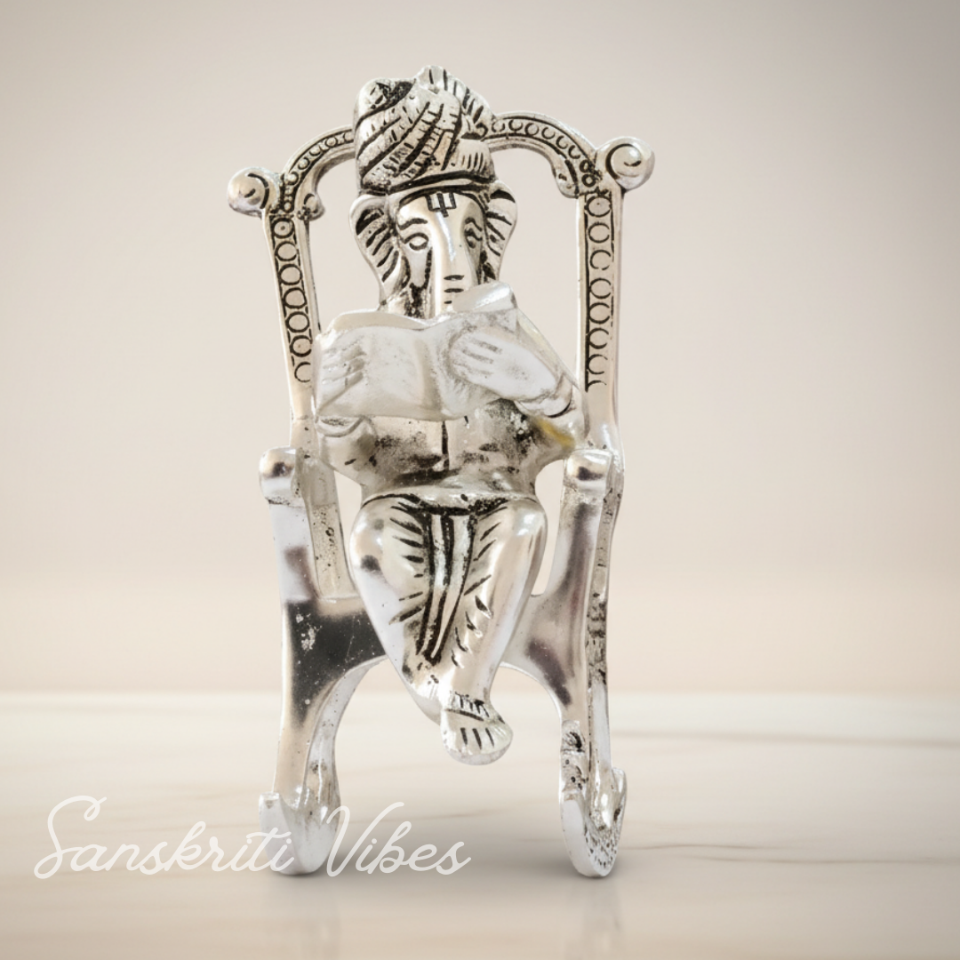 Metal Chair Ganesh Ganpati Idol with Reading Ramayan Metallic Gold Finish Traditional Indian Decorative Showpiece