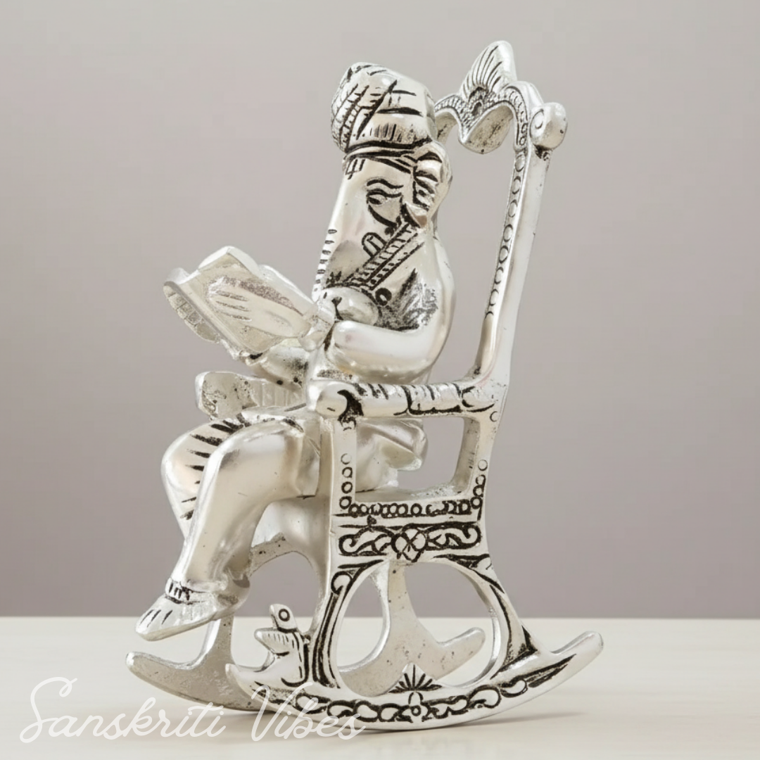 Metal Chair Ganesh Ganpati Idol with Reading Ramayan Metallic Gold Finish Traditional Indian Decorative Showpiece
