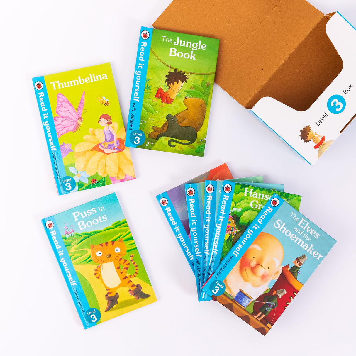 Ladybird Read It Yourself Tuck Box Level 3: 8 Books Box Set (The Elves and the Shoemaker, Hansel and Gretel, Jack and the Beanstalk, Rapunzel, Aladdin, Puss in Boots, The Jungle Book, Thumbelina) - Retail Maharaj
