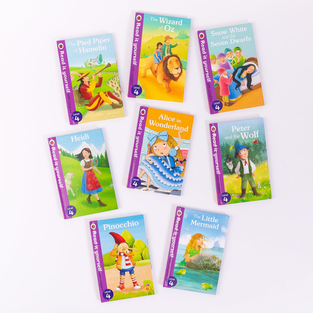 Ladybird Read It Yourself Tuck Box Level 4: 8 Books Box Set (Heidi, The Little Mermaid, Peter and the Wolf, Alice in Wonderland, Pinocchio, Snow White and the Seven Dwarfs, The Wizard of Oz and More) - Retail Maharaj
