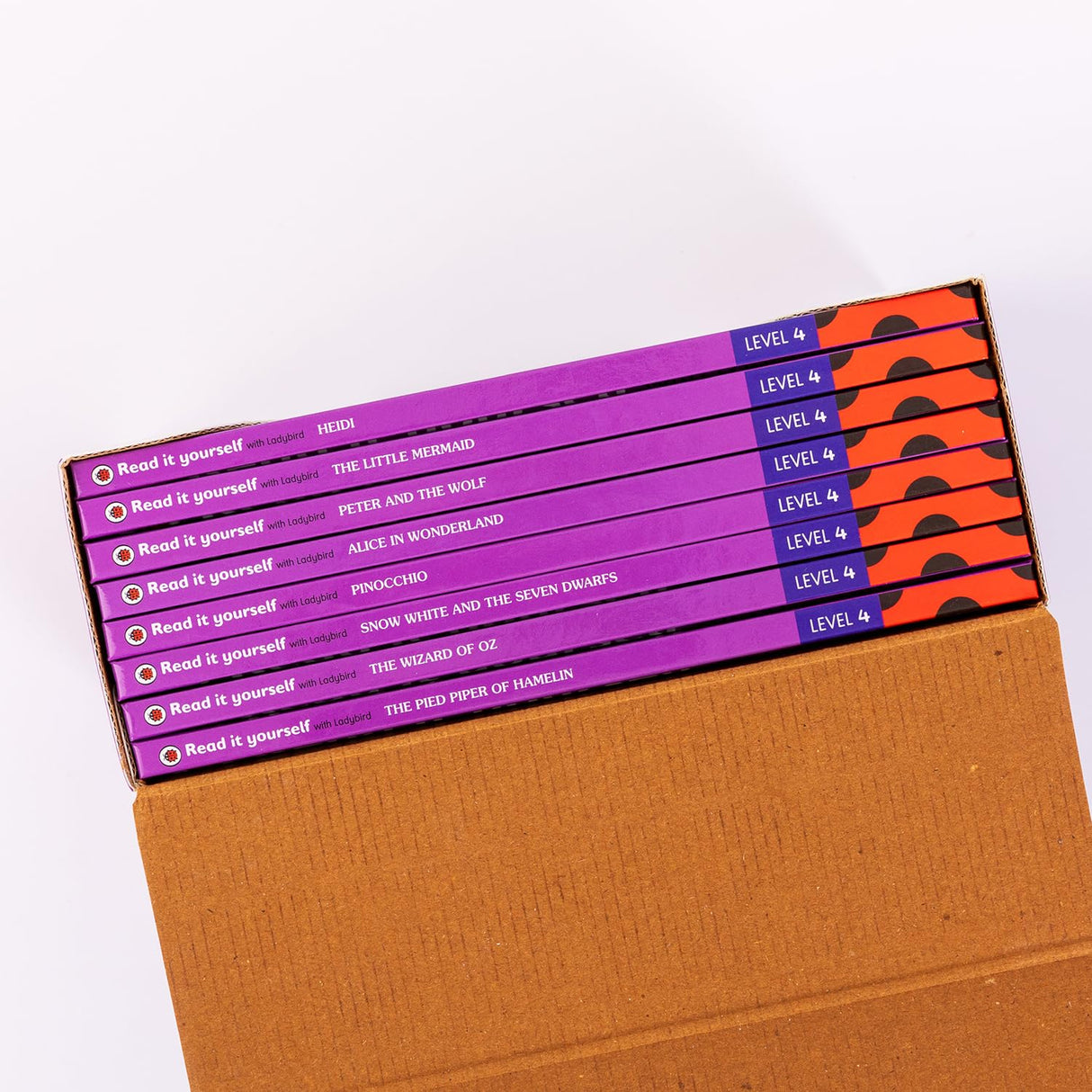 Ladybird Read It Yourself Tuck Box Level 4: 8 Books Box Set (Heidi, The Little Mermaid, Peter and the Wolf, Alice in Wonderland, Pinocchio, Snow White and the Seven Dwarfs, The Wizard of Oz and More) - Retail Maharaj