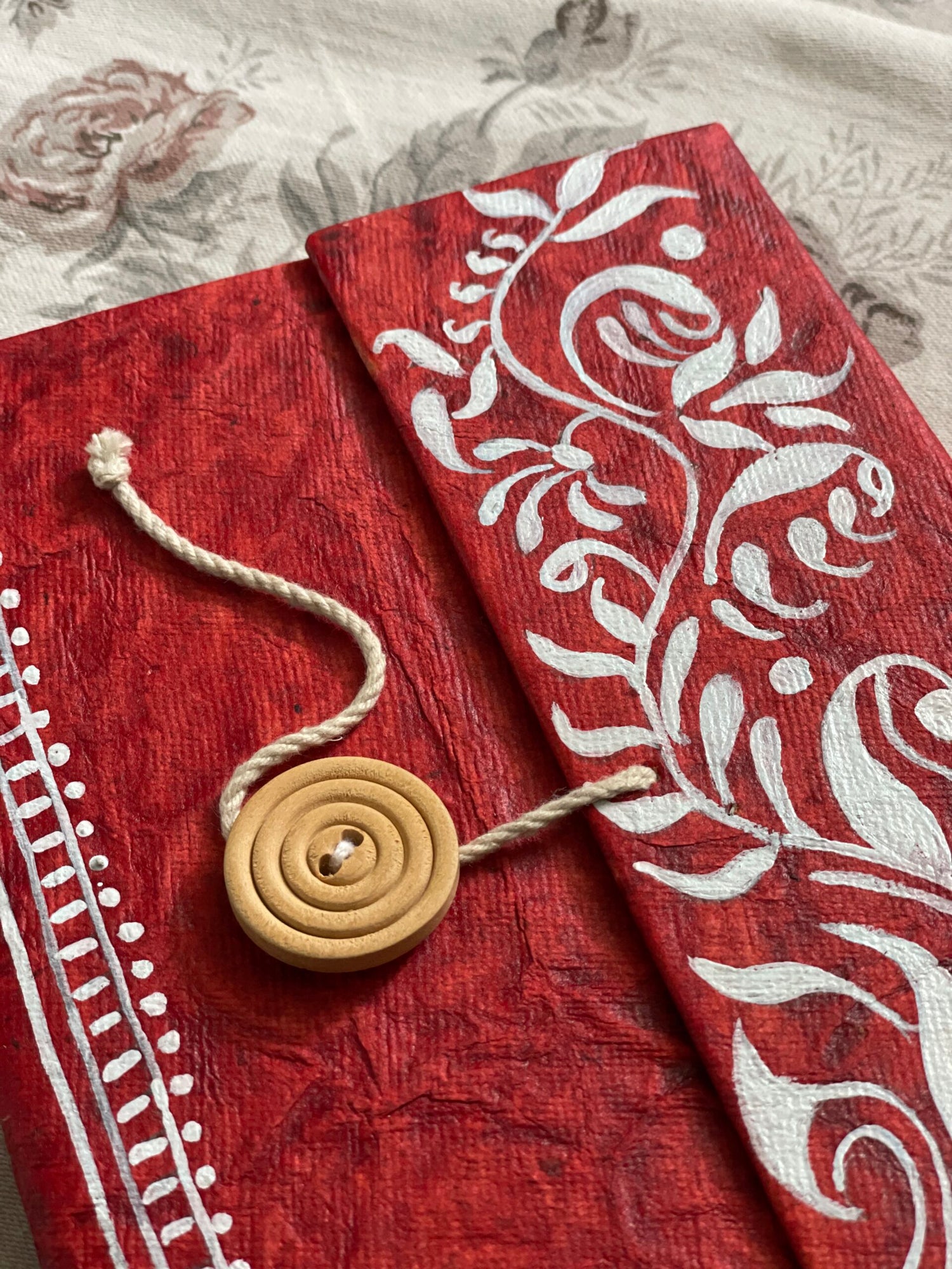 Lal Pata Eco Folder – Handmade by Innocent Hands | Hand-Painted White Floral Motifs on Eco-Friendly Paper - Retail Maharaj