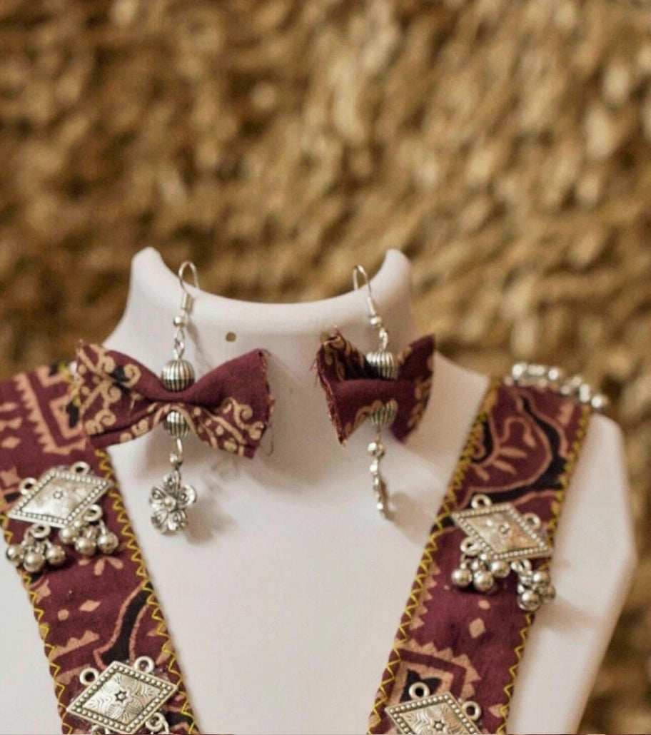 Madhurya Tribal Art Necklace Set - Hand-painted Tribal Locket with Maroon Handloom Fabric - Retail Maharaj