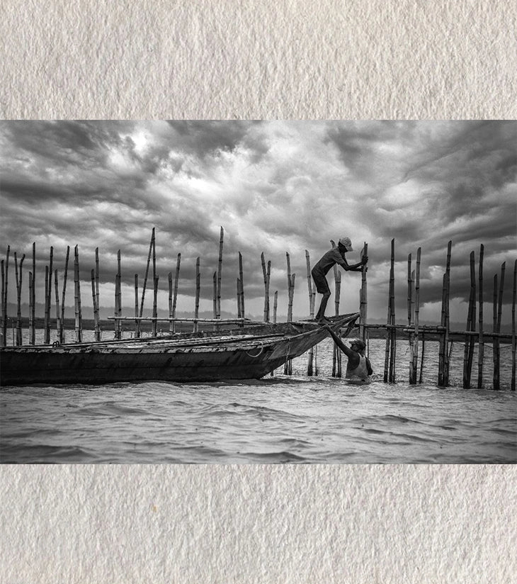 Saving the Boat – Chilika Lake, Odisha – Fine Art Photograph by Sayantan Sengupta - Retail Maharaj