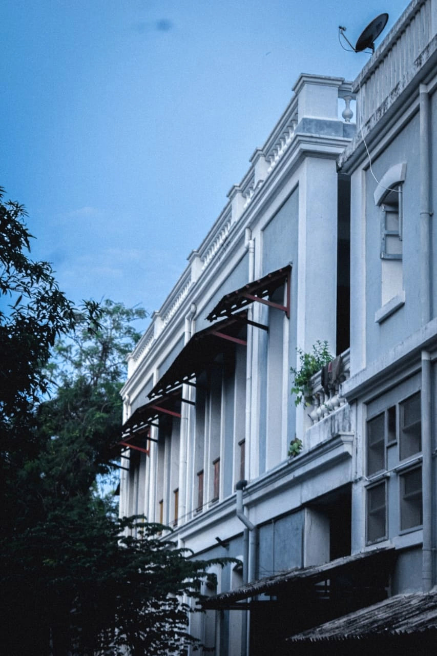 Echoes of Colonial Calm – Pastel Serenity in Architectural Elegance - Retail Maharaj