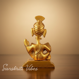 Metal Lord Pagdi Ganesha Reading Ramayana Idol Gold Plated Sitting Statue for Home and Office Decoration