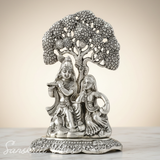 Metal Radha Krishna Idol Under Tree | Silver Decorative Showpiece Statue for Puja Room, Home & Office Desk – 18 cm Spiritual Gift