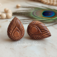 Handmade Peacock Feather Tulsi Studs – Unisex Spiritual Earrings with Intricate Carving - Retail Maharaj