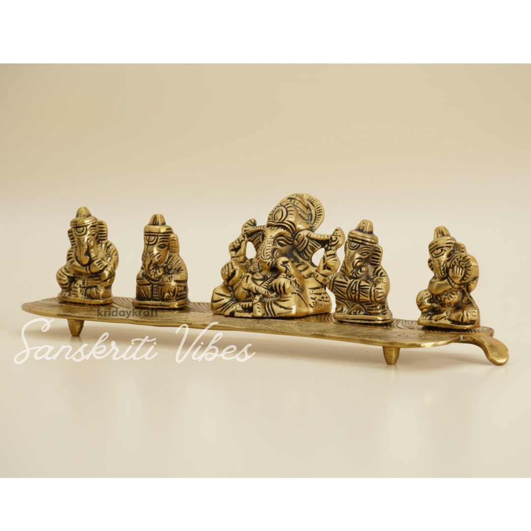 White Metal Gold Plated Ganesha On Leaf With Musical Instrument Metal Statue For Pooja Home Decor And Gift Purpose
