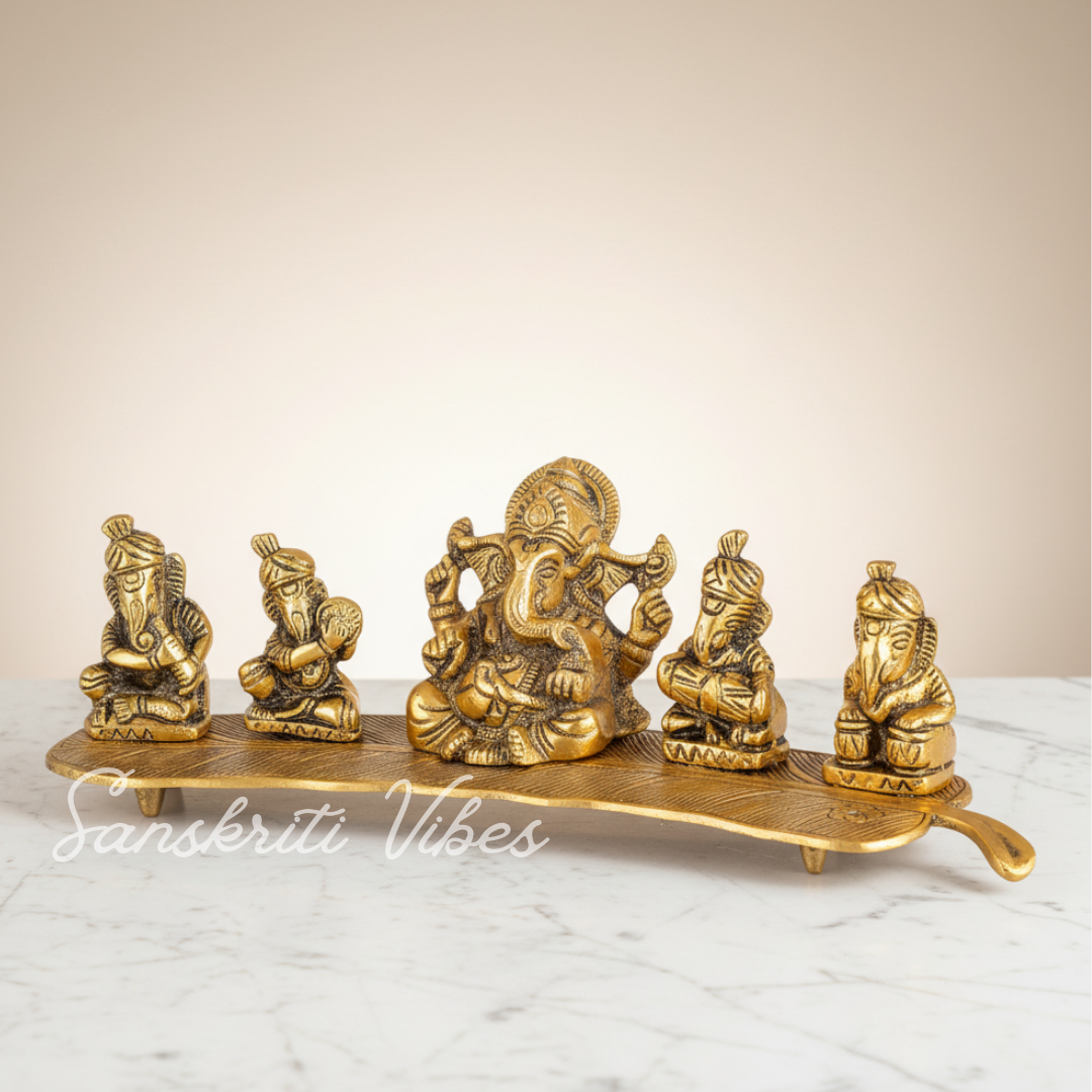 White Metal Gold Plated Ganesha On Leaf With Musical Instrument Metal Statue For Pooja Home Decor And Gift Purpose