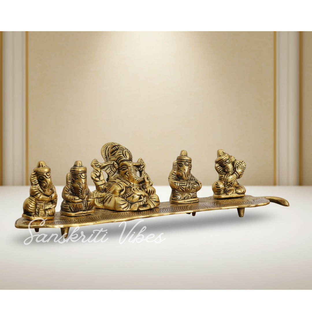 White Metal Gold Plated Ganesha On Leaf With Musical Instrument Metal Statue For Pooja Home Decor And Gift Purpose