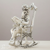 Metal Chair Ganesh Ganpati Idol with Reading Ramayan Metallic Gold Finish Traditional Indian Decorative Showpiece