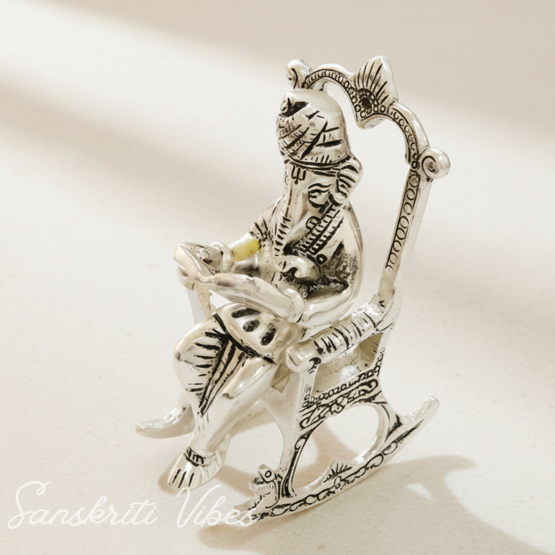 Metal Chair Ganesh Ganpati Idol with Reading Ramayan Metallic Gold Finish Traditional Indian Decorative Showpiece