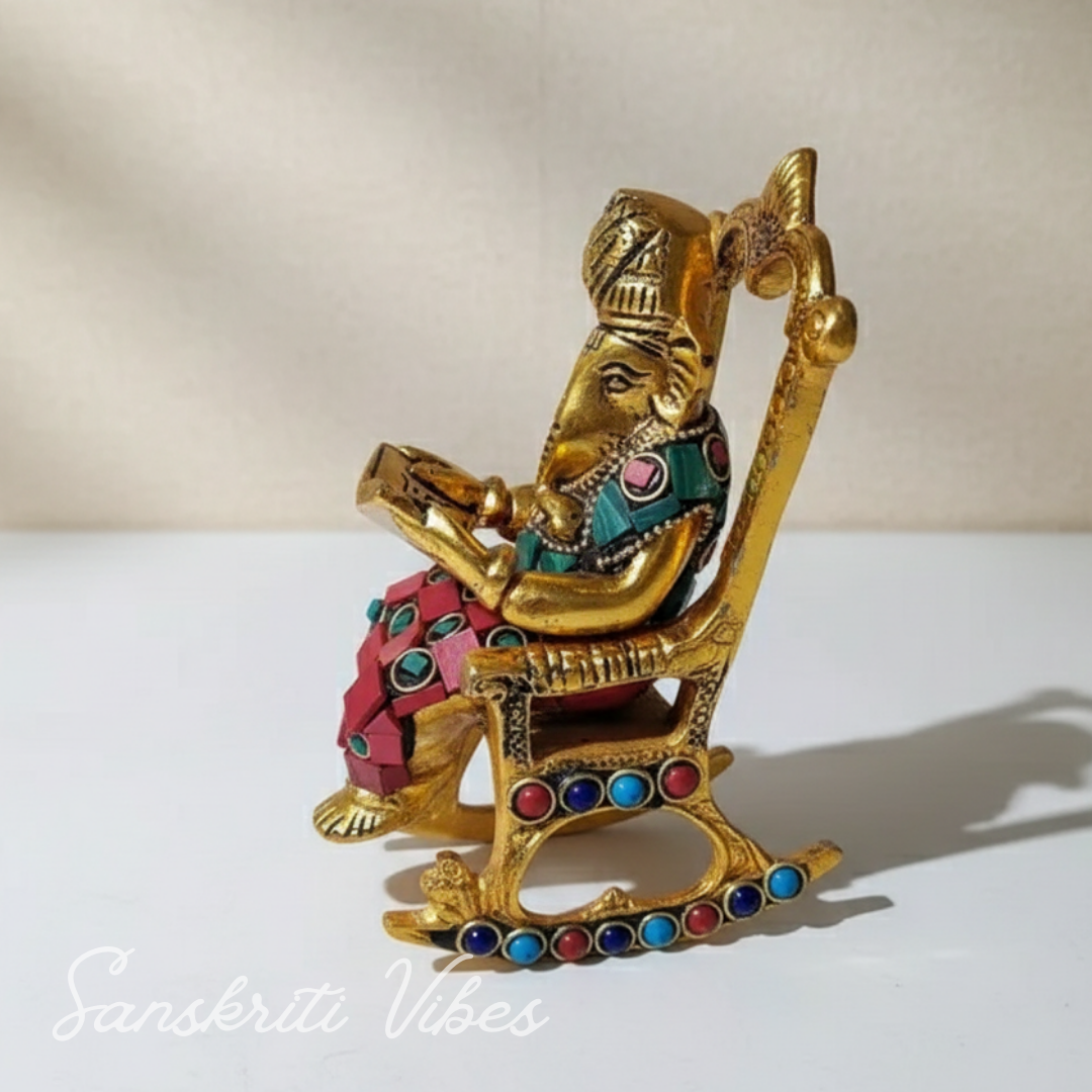 Modern Chair Ganesha Metal Statue Reading Ramayan with Stone Work Showpiece for Home Glossy Finish Ganpati Idol