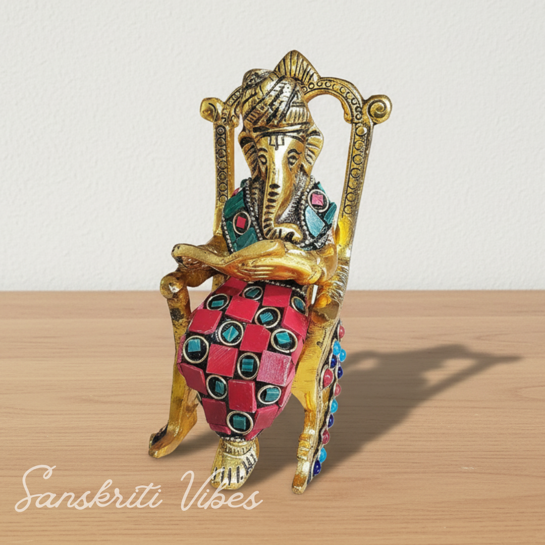 Modern Chair Ganesha Metal Statue Reading Ramayan with Stone Work Showpiece for Home Glossy Finish Ganpati Idol
