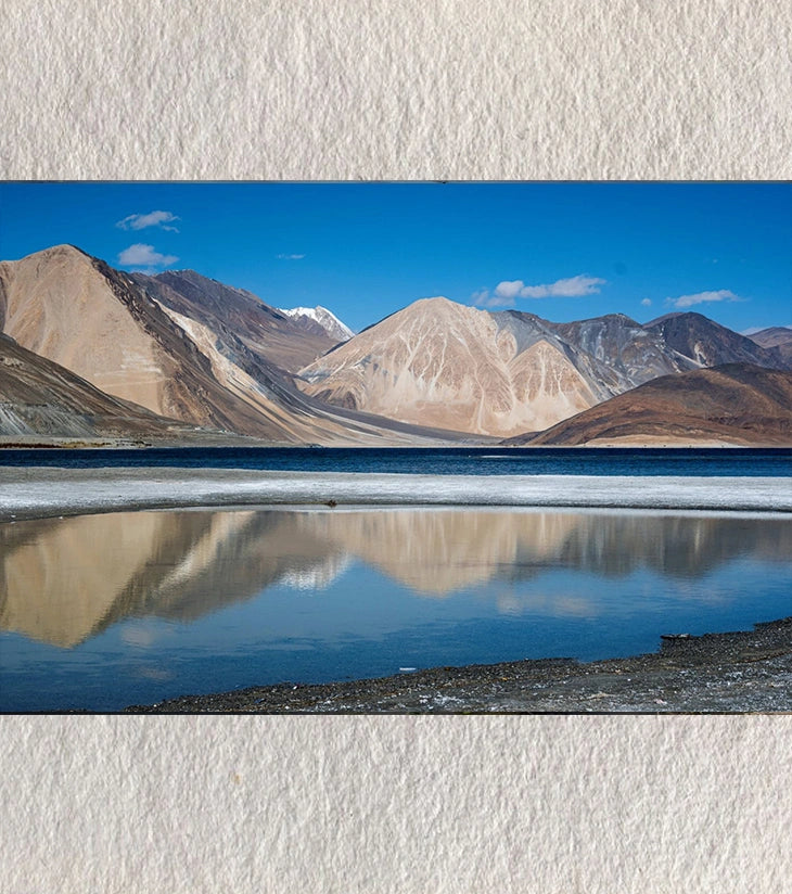 “Reflections of Solitude – Pangong Lake, Ladakh” by Debarshi Guha Roy