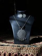 Floral Radiance Pendant Set – Oxidized German Silver Floral Motif Necklace & Earrings with Dangling Beads